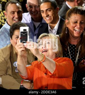 NO FILM, NO VIDEO, NO TV, NO DOCUMENTARY - Democratic presidential nominee Hillary Clinton takes a selfie with supporters during a rally at the Osceola Heritage Park Exhibition Hall on Monday, Aug. 8, 2016 in Kissimmee, Fla. Earlier in the day, Clinton campaigned in St. Petersburg, FL, USA. Photo by Joe Burbank/Orlando Sentinel/TNS/ABACAPRESS.COM Stock Photo