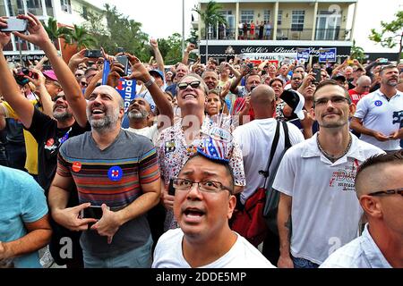 NO FILM, NO VIDEO, NO TV, NO DOCUMENTARY - Arnie Cuarenta, front center, of Fort Lauderdale, Fla. cheers in the overflow crowd outside as Democratic presidential nominee Hillary Clinton holds a rally on Sunday, October 30, 2016 at The Manor Complex in Wilton Manors, FL, USA. Photo by Patrick Farrell/Miami Herald/TNS/ABACAPRESS.COM Stock Photo