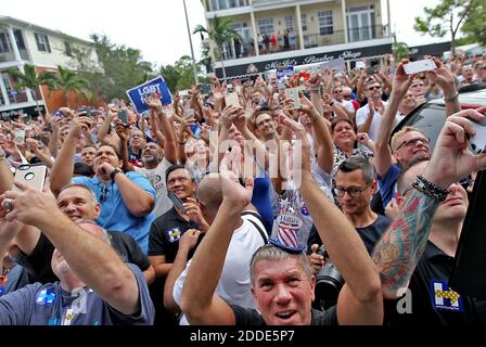 NO FILM, NO VIDEO, NO TV, NO DOCUMENTARY - Steve Smith, front center, of Fort Lauderdale, Fla. cheers in the overflow crowd outside as Democratic presidential nominee Hillary Clinton holds a rally on Sunday, October 30, 2016 at The Manor Complex in Wilton Manors, FL, USA. Photo by Patrick Farrell/Miami Herald/TNS/ABACAPRESS.COM Stock Photo