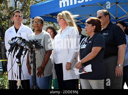 NO FILM, NO VIDEO, NO TV, NO DOCUMENTARY - Vendetta Craig, who had left her 87-year-old mother Edna Jefferson in the care of the Rehabilitation Center of Hollywood Hills, speaks during a news conference flanked by, from left, Dr. Randy Katz, Medical Director, Emergency Services, Judy Frum, RN, Chief Nursing Officer, and Tracy Meltzer, director of nursing. The news conference took place a day after eight people died at the nursing home, as a criminal investigation by local agencies continued into how the rehab center allowed patients to stay without a working air conditioning system during the Stock Photo