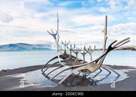 Sun Voyager monument with the bay and mountains in background Stock Photo