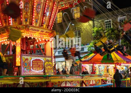 Petworth Fair has been in existance for 800 years by Royal Charter. The Harris family operate the traditional gallopers and chairoplanes. Stock Photo