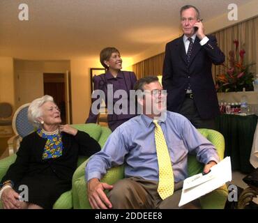 NO FILM, NO VIDEO, NO TV, NO DOCUMENTARY - Former President George H.W. Bush takes a phone call as Republican gubernatorial candidate Gov. Jeb Bush watches returns with his parents, with First Lady Barbara Bush, and wife Columba Bush, in Miami, Fla., Nov. 5, 2002. George H.W. Bush died Friday, Nov. 30, 2018, at the age of 94. Photo by Joe Burbank/Orlando Sentinel/TNS/ABACAPRESS.COM Stock Photo