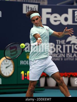 NO FILM, NO VIDEO, NO TV, NO DOCUMENTARY - Roger Federer, of Switzerland, returns to John Isner, of the United States, during the final of the Miami Open tennis tournament at Hard Rock Stadium on Sunday, March 31, 2019, in Miami Gardens, Fla. Roger Federer won 6-1, 6-4. Photo by David Santiago/Miami Herald/TNS/ABACARESS.COM Stock Photo