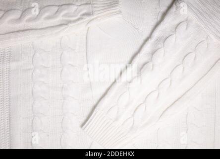 Knitted white winter sweater texture can be background Stock Photo