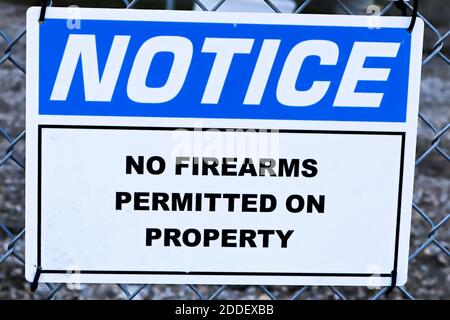 A Notice, No Firearms Permitted on Property sign Stock Photo