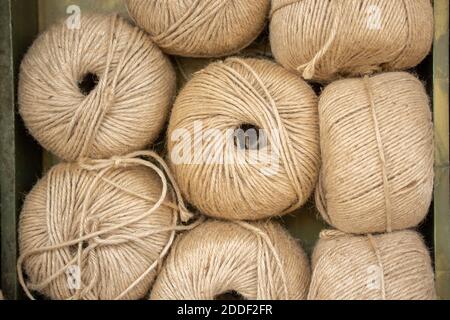 Plenty of spools or rolls of brown color linen string Stock Photo Alamy