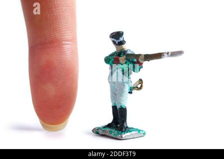 Image of handmade vintage tin soldier on the white background Stock Photo