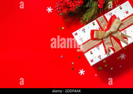 Christmas or New Year concept. Christmas presents gift red on  red background. Flat top view. Copy space. Stock Photo