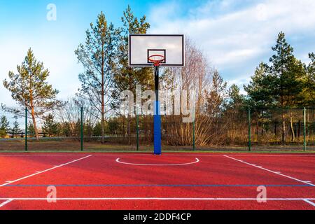 An empty basketball court found in the outdoors Stock Photo