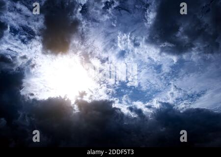 Light in the Dark and Dramatic Storm Clouds Stock Photo