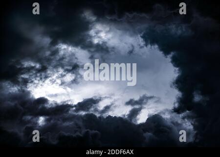 Dark and Dramatic Storm Clouds Area Background Stock Photo