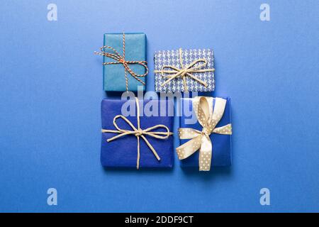 Blue gift boxes on blue background. top view Stock Photo