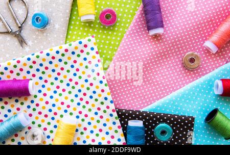 Sewing accessories and fabric. Top view, flat lay. Stock Photo