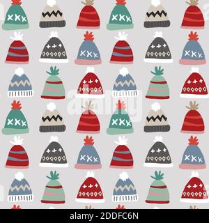 Christmas seamless pattern with colorful knitted hats. Set of wool caps. Hand drawn kids nordic fashion design. Scandinavian winter vector Stock Vector