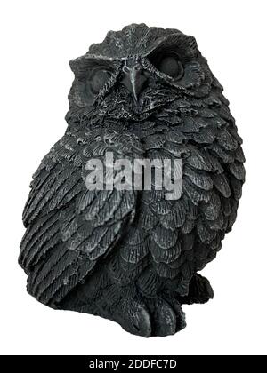 Black decorative owl figure made of clay isolated on white background. Symbol of science, wisdom, mind, mindfulness, thinking, clever, calm, silent Stock Photo