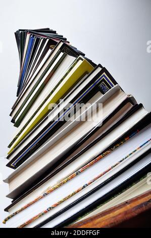 A big tower of many books vertical Stock Photo