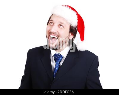 Young male model in suit with santa hat on head Stock Photo