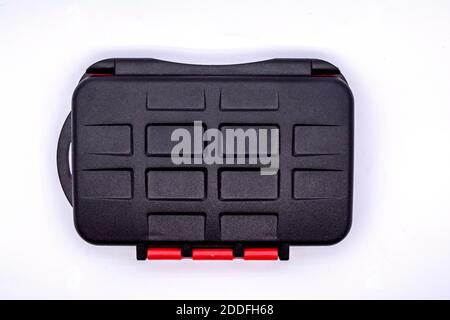 small useful calling card or memory card holder isolated over white background. Card holder to carry your memory cards or sim cards. Stock Photo