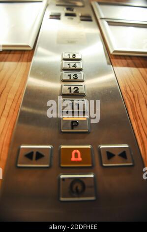 Shallow depth of field (selective focus) image with the buttons inside an elevator. Stock Photo
