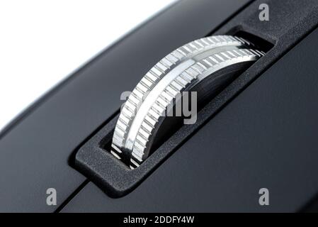 A macro shot of a metal roller from a modern wireless computer mouse. Stock Photo