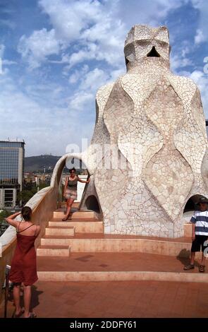 On the roof of the Casa Milà, (La Pedrera), Passeig de Gràcia, Barcelona, Catalonia, Spain.  MODEL RELEASED Stock Photo