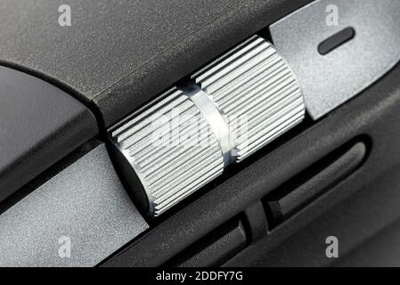 A macro shot of a metal roller from a modern wireless computer mouse. Stock Photo