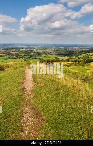 Looking along the Iron Age Bank at Crickley HIll Iron Age Fort towards Cheltenham Spa, Gloucestershire, England Stock Photo