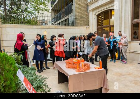 Iranian young people having a family private party for celebrating