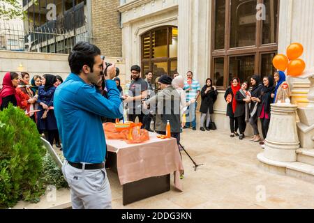 Iranian young people having a family private party for celebrating