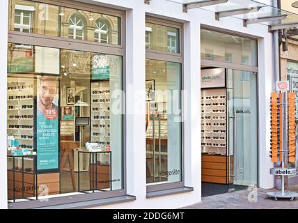 Side view of a window store on the shopping street in the city center. Stock Photo