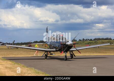 A Beechcraft T-6 Texan II trainer airplane, flown by the New Zealand Air Force's 'Black Falcons' aerobatic team Stock Photo