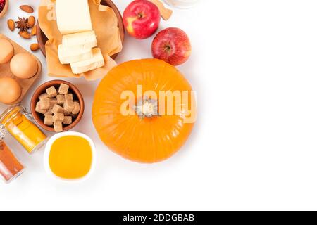 Ingredients for preparing pumpkin pie on white background Stock Photo