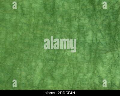 The surface texture of green color and crumpled canvas fabric Stock Photo