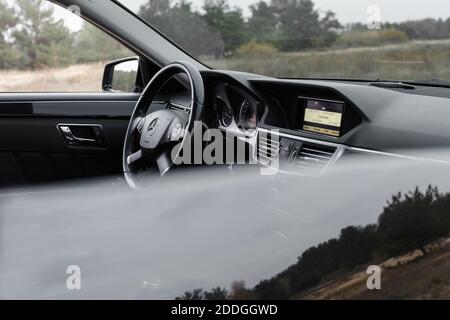 Black leather interior, Mercedes Benz W211 Avantgarde with upholstery  combined with leather and textile, no people Stock Photo - Alamy