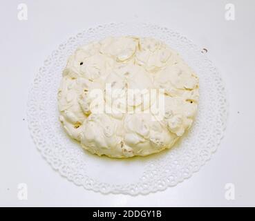 Calabrian typical white nougat cake isolated on white background in Italy Stock Photo