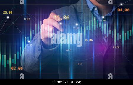 Business Analytics. Businessman touching digital screen with financial charts and economic diagrams Stock Photo