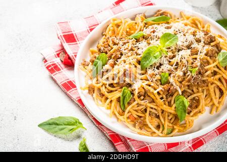 Pasta Bolognese in white plate. Stock Photo