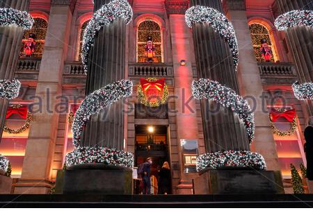Edinburgh, Scotland, UK. 25th Nov 2020. Early Christmas lights decorating the pillars outside the Dome Bar and Restaurant in George Street.   Credit: Craig Brown/Alamy Live News Stock Photo