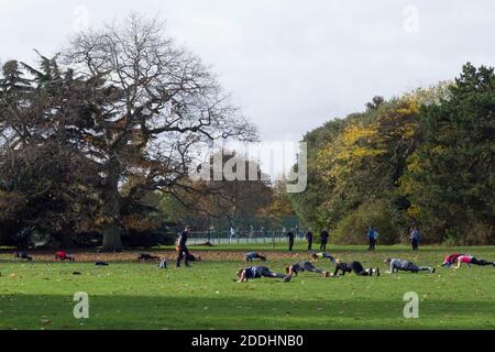 People doing outdoor exercise in Greenwich Park before national lockdown commenced in December 2020 to stop covid19 from spreading in England Stock Photo