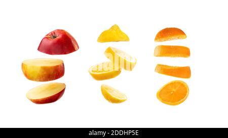 Set of sliced fruits: apple, lemon and orange cuts floating on white background. Fruit slices on bright backdrop. Stock Photo
