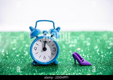 Christmas decoration with alarm clock. Merry Christmas sale concept in macro. Christmas shopping  abstraction. Stock Photo