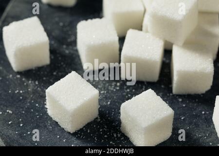 Sweet Organic White Sugar Cubes in a Bunch Stock Photo