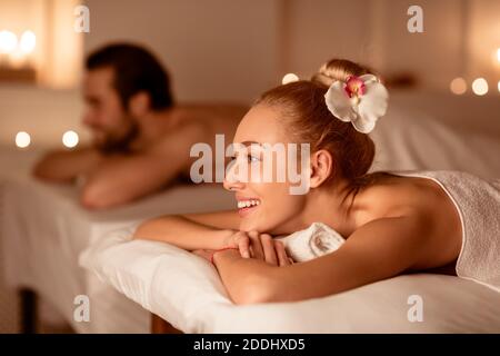 Couple Relaxing In Spa Resort Lying Waiting For Ayurvedic Massage Stock Photo