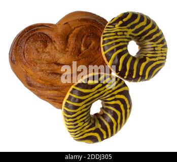 Appetizing American donuts and other pastries on white plate isolated Stock Photo