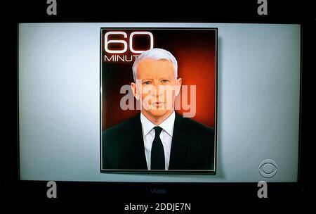 A television screenshot of Anderson Cooper, a correspondent for the CBS weekly program 60 Minutes. Stock Photo