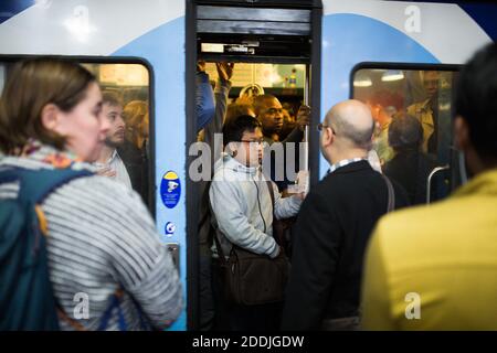 Commuters try to get in a RER train at Gare Du Nord station in Paris, France on September 13, 2019. A one-day strike of Paris public transports operator RATP employees is called by unions over French government's plan to overhaul the country's retirement system. Ten of the city's 16 metro lines were shut down completely, while service on most others was 'extremely disrupted,' the RATP transit operator said. The city's burgeoning cycle lane system was seeing a surge in traffic as people pulled out bikes to get to work. Photo by Rafael Lafargue/ABACAPRESS.COM Stock Photo