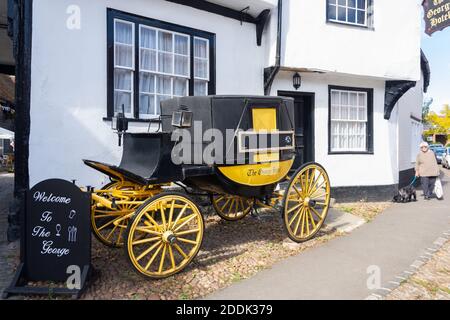 Horse carriage outside 15th century The George Hotel, High Street, Dorchester-on-Thames, Oxfordshire, England, United Kingdom Stock Photo
