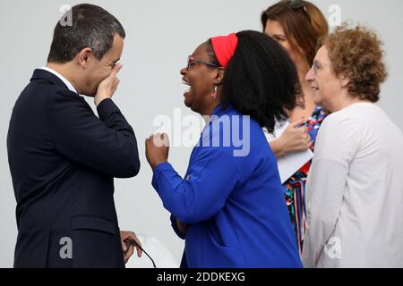 Gérald Darmanin, ministre de lÂ’Action et des Comptes publics, Sibeth NDiaye, secrétaire d'État auprès du Premier ministre et Porte-parole du gouvernement, Marlène Schiappa, secrétaire dÂ’Etat, chargée de lÂ’Egalité des femmes et des hommes, Muriel Pénicaud, ministre du Travail, lors du 139ème défilé militaire du 14 juillet sur les Champs-Elysées, jour de la Fête Nationale. Paris, le 14 juillet 2019. Photo Stephane Lemouton/Pool/ABACAPRESS.COM Stock Photo