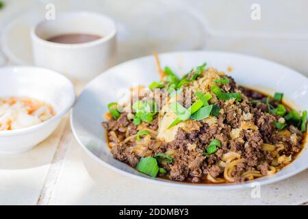 A bowl of a regional noodle dish called pansit batil patung at a local noodle house in Quezon City, Philippines Stock Photo